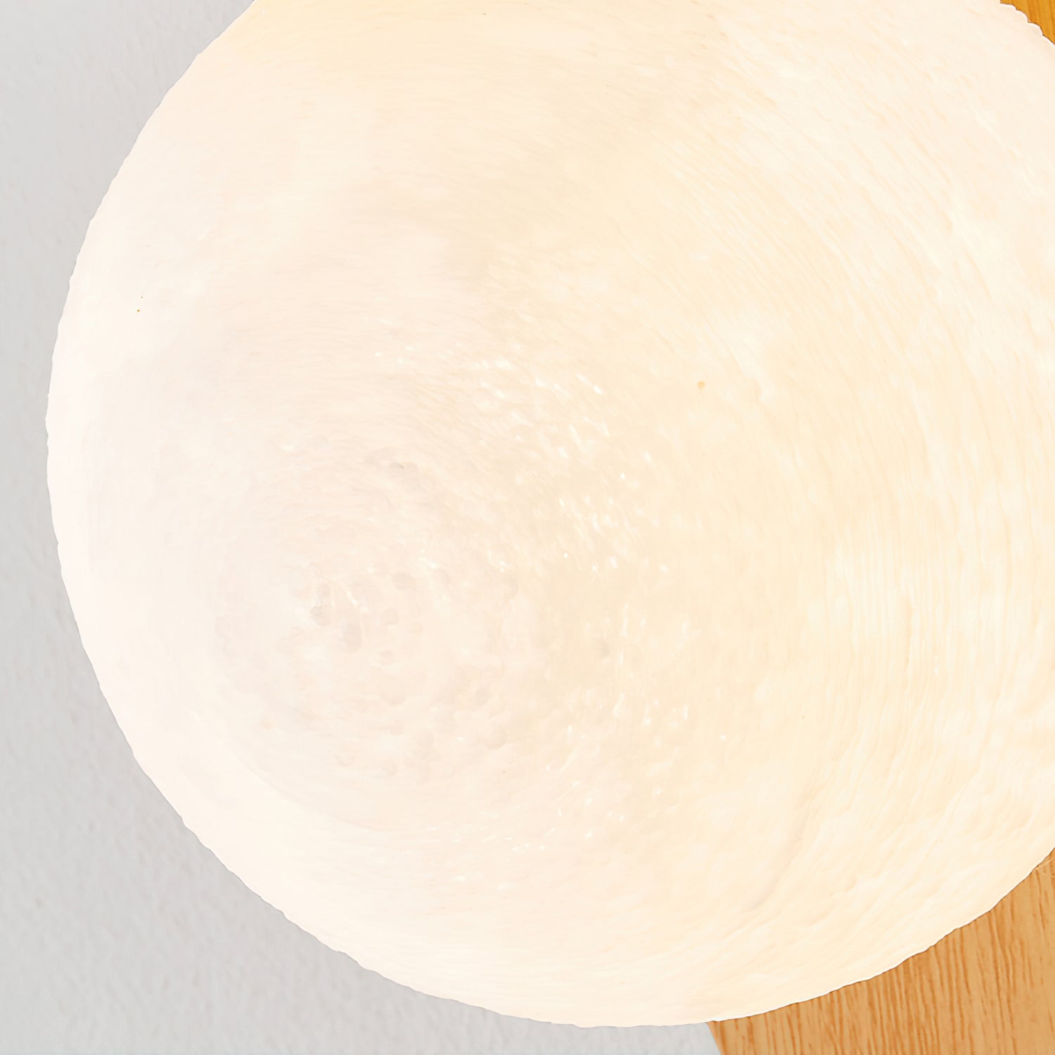 Curved Fixture and Frosted Globe Wall Lamp