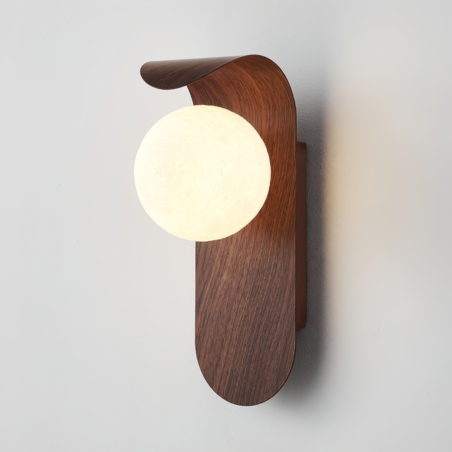 Curved Fixture and Frosted Globe Wall Lamp