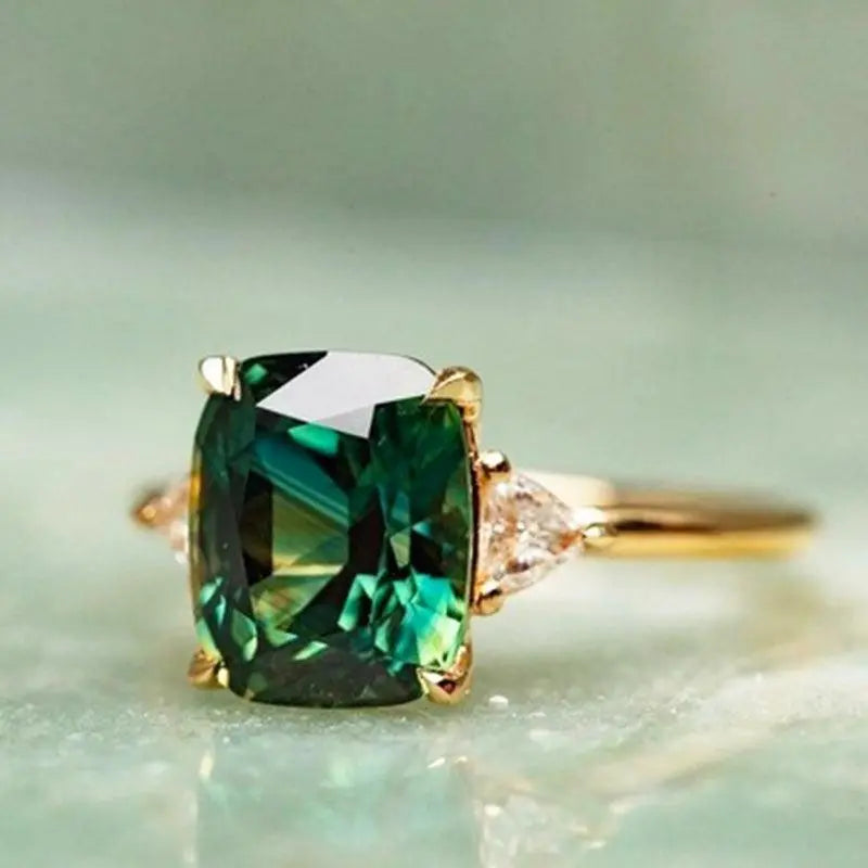 Women's Emerald Green Solitaire Ring with Gold-Tone Band