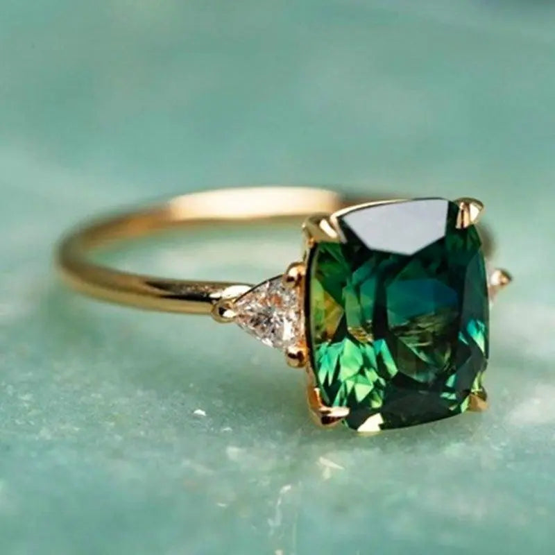 Women's Emerald Green Solitaire Ring with Gold-Tone Band